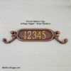 Ornate Sign with Brass Numbers